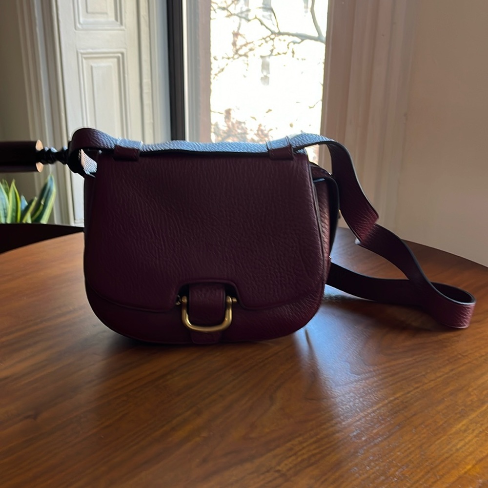 Pebbled leather crossbody saddle bag